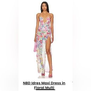 Lightweight chiffon fabric with floral accents and side seam slit